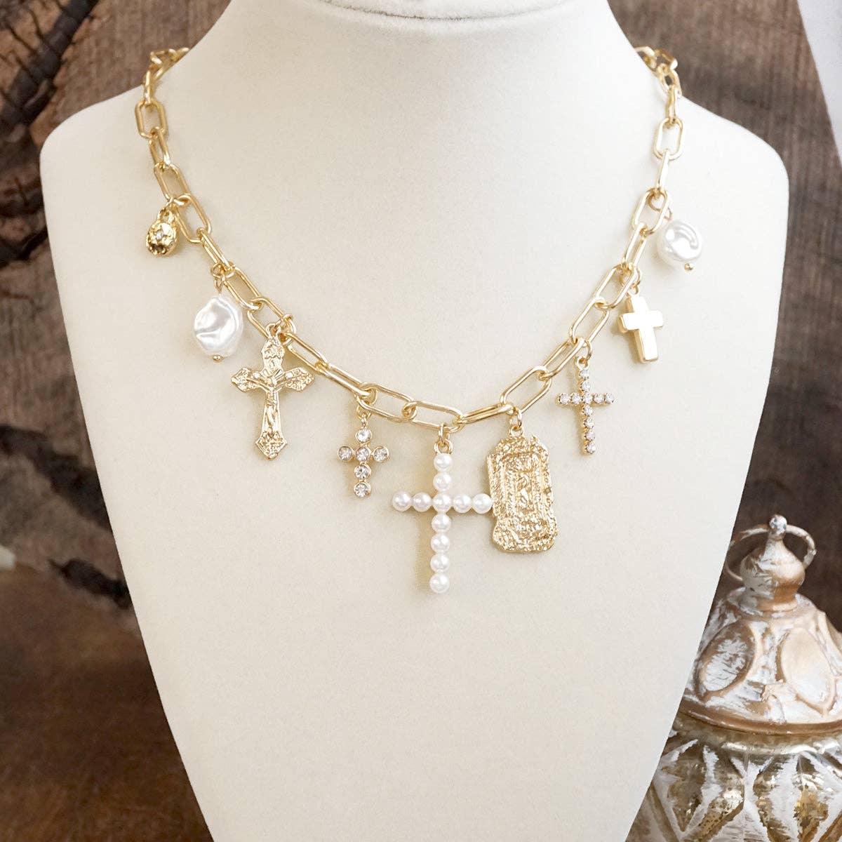 Radiant Faith β Mixed Charm Cascade Necklace in Gold Tone