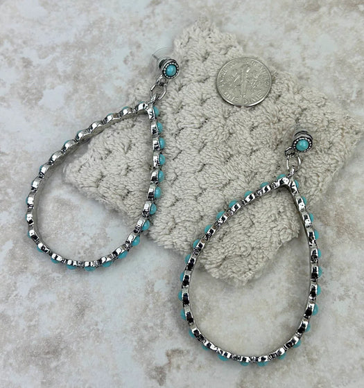 New WE Turquoise Silver Trim Earring
